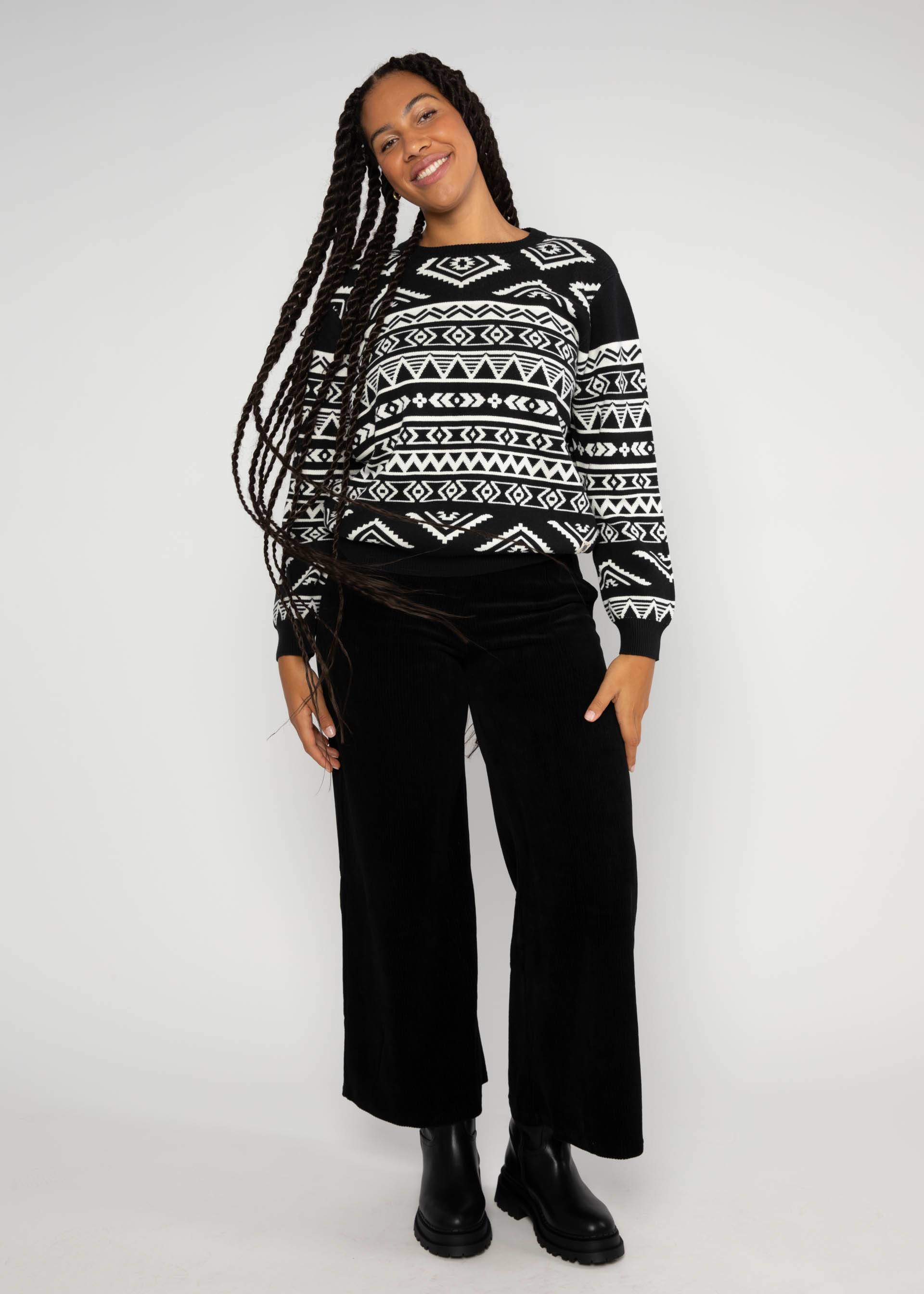 Strickpullover Cosy Storyteller, world traveller, Strickpullover, Schwarz